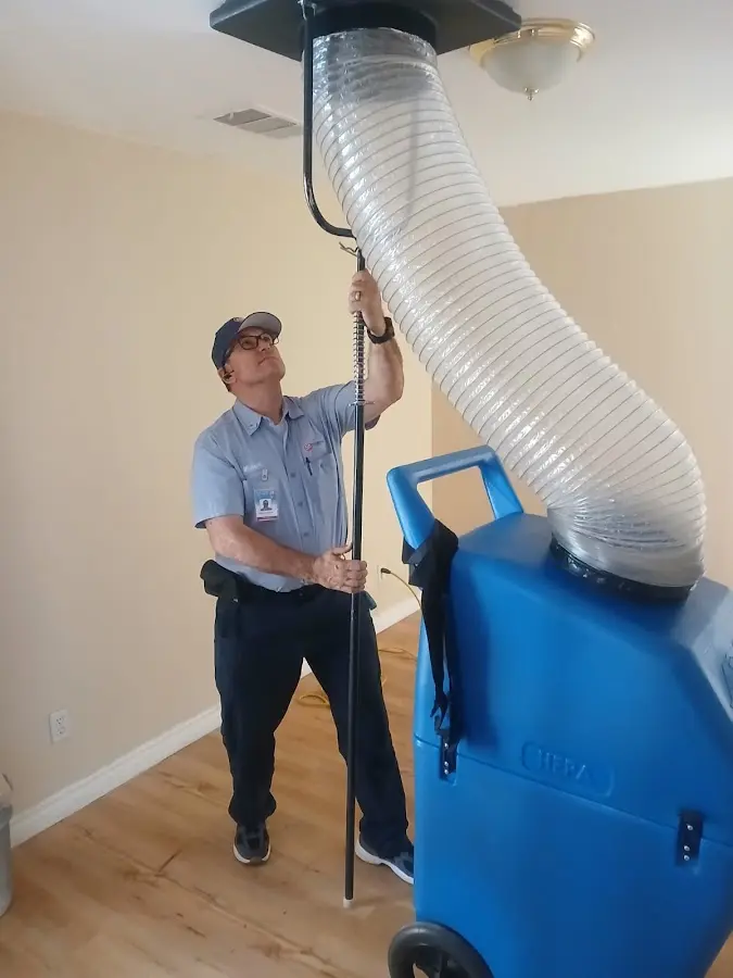 HVAC Installation technician using HEPA equipment in Harvey